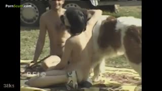 Guy and girl on the farm enjoying sex with Saint Bernard